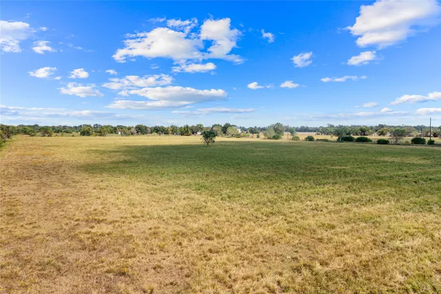 a view of an ocean and city