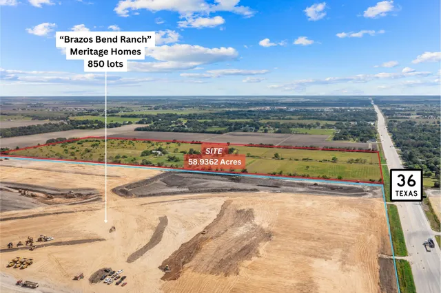 a view of a swimming pool with an outdoor seating