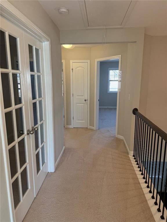 1219 Fischer Trace Cumming, GA 30041 - Photo 11 of 20 a view of a hallway with wooden floor and entryway