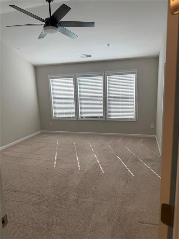 1219 Fischer Trace Cumming, GA 30041 - Photo 12 of 20 an empty room with a empty space and windows