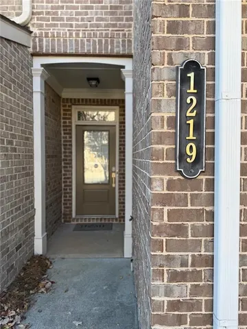 a front view of a house with parking