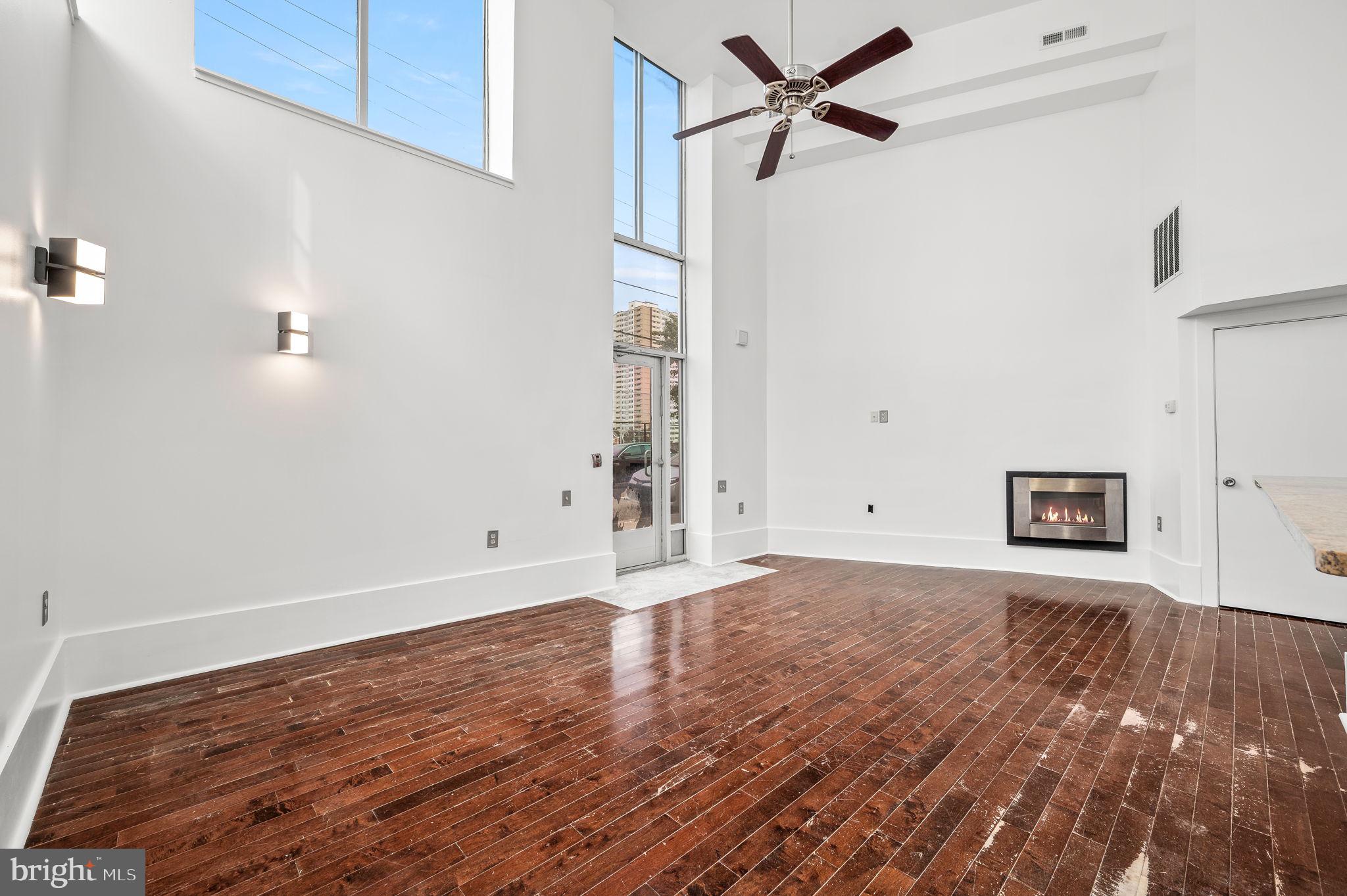 Living Room/Dining Room with 2-Story Ceilings