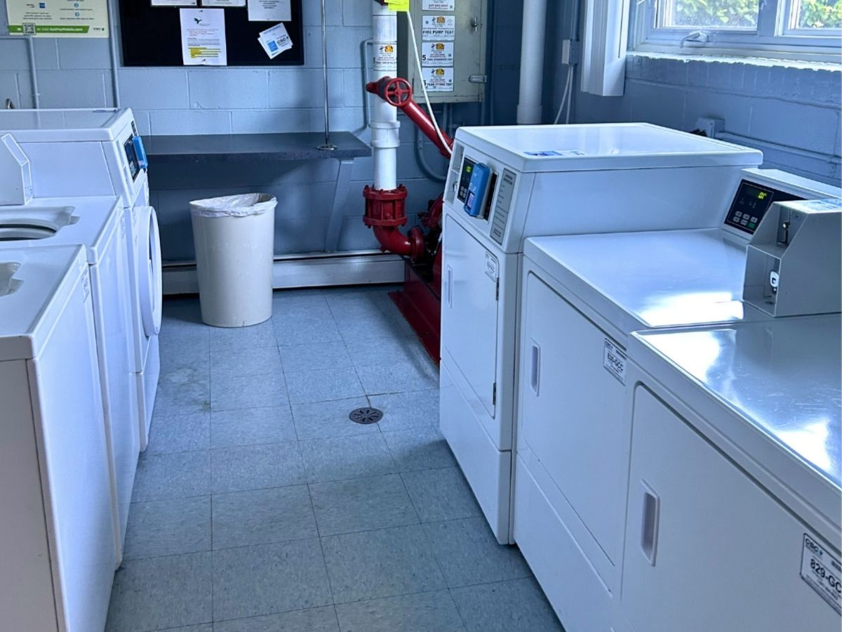 1206 New Wilke Road, Unit 206 Arlington Heights, IL 60005 - Photo 17 of 17 a utility room with dryer and washer