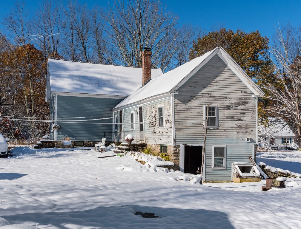 700 Mason Road Holden, MA 01522 - Photo 8 of 35 a view of a house with a patio