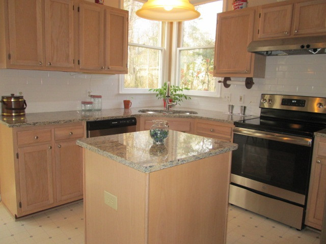 9721 Talman Court Raleigh, NC 27615 - Photo 14 of 30 New Tile Backsplash