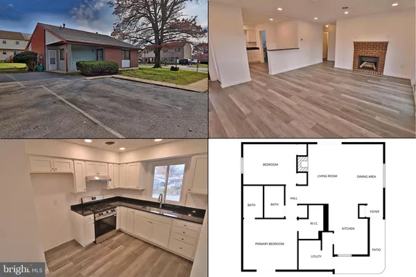 a kitchen view with stainless steel appliances kitchen island granite countertop a sink and cabinets