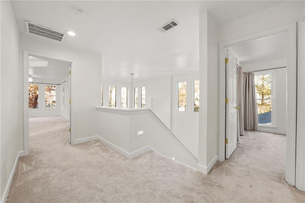 1086 Pine Grove Avenue Northeast Brookhaven, GA 30319 - Photo 16 of 33 wooden floor and windows in a room