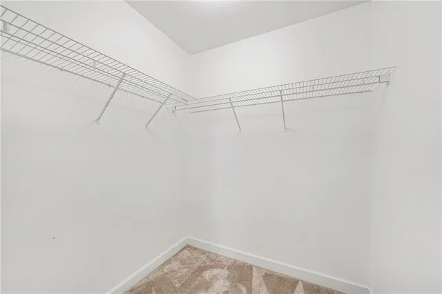 a view of a room with racks on the wall