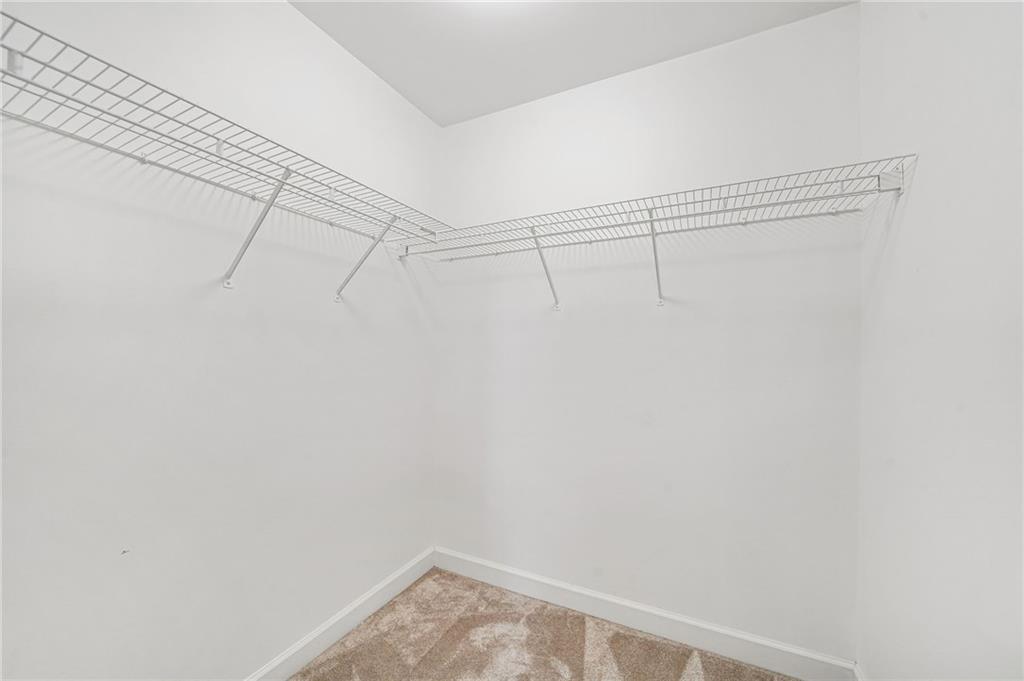 1086 Pine Grove Avenue Northeast Brookhaven, GA 30319 - Photo 25 of 33 a view of a room with racks on the wall