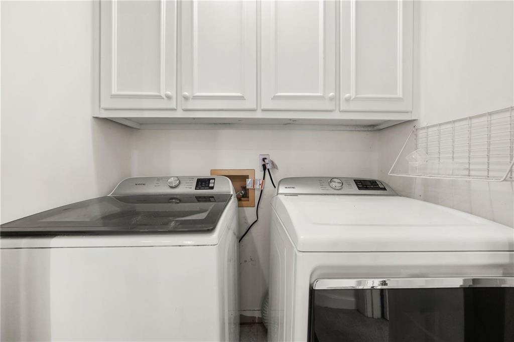 1086 Pine Grove Avenue Northeast Brookhaven, GA 30319 - Photo 26 of 33 a utility room with dryer and washer