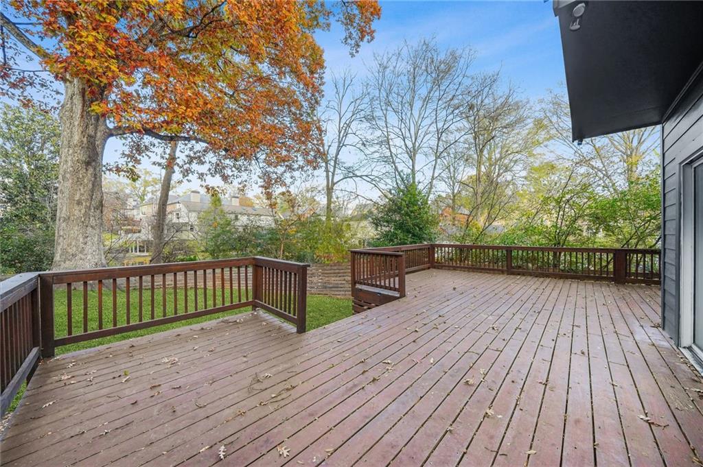 1086 Pine Grove Avenue Northeast Brookhaven, GA 30319 - Photo 27 of 33 a view of balcony with wooden floor and fence