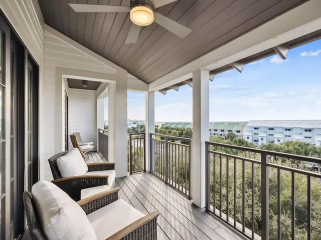 a view of balcony with furniture
