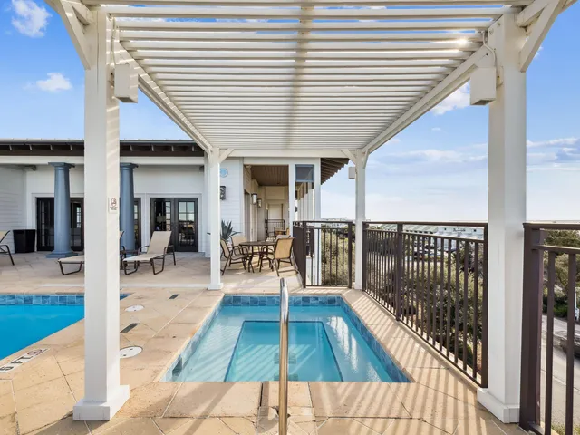 a view of a patio with wooden floor