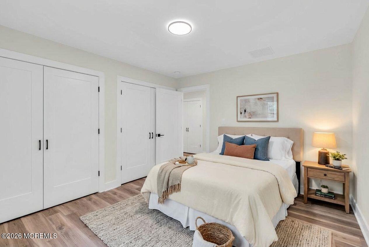 1730 Old Freehold Road Toms River, NJ 08755 - Photo 29 of 41 a bedroom with a bed and a night stand