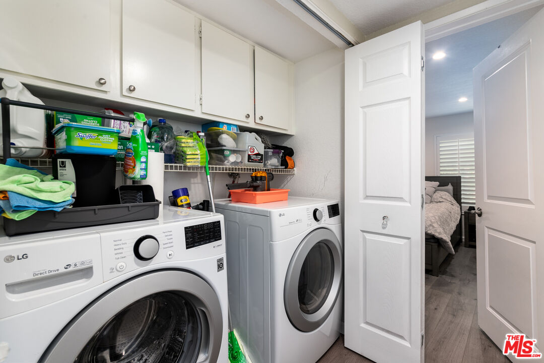 231 Bethany Road, Unit 210 Burbank, CA 91504 - Photo 18 of 22 a view of kitchen and washer and dryer