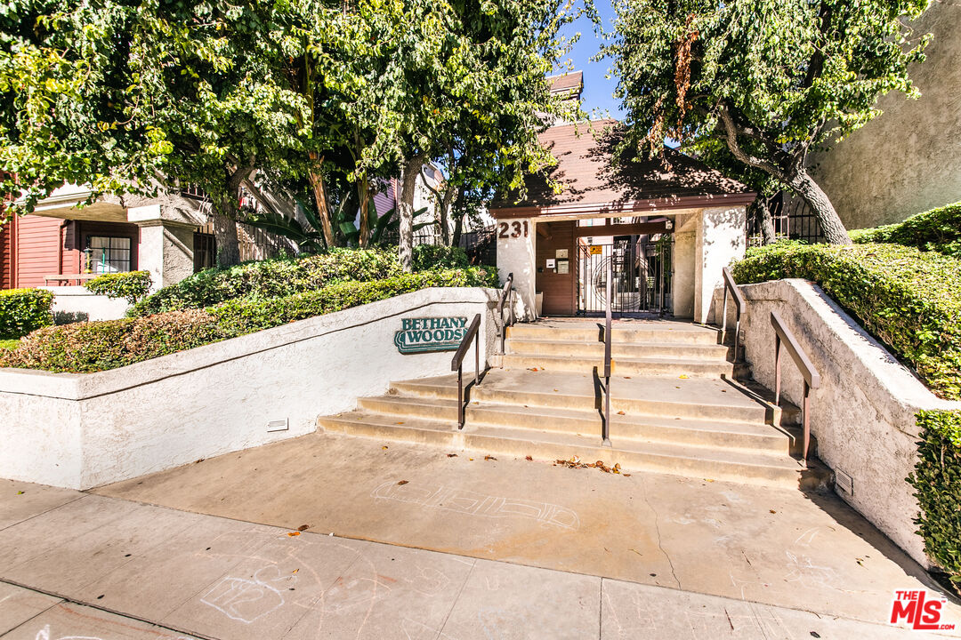 231 Bethany Road, Unit 210 Burbank, CA 91504 - Photo 22 of 22 a view of house with yard