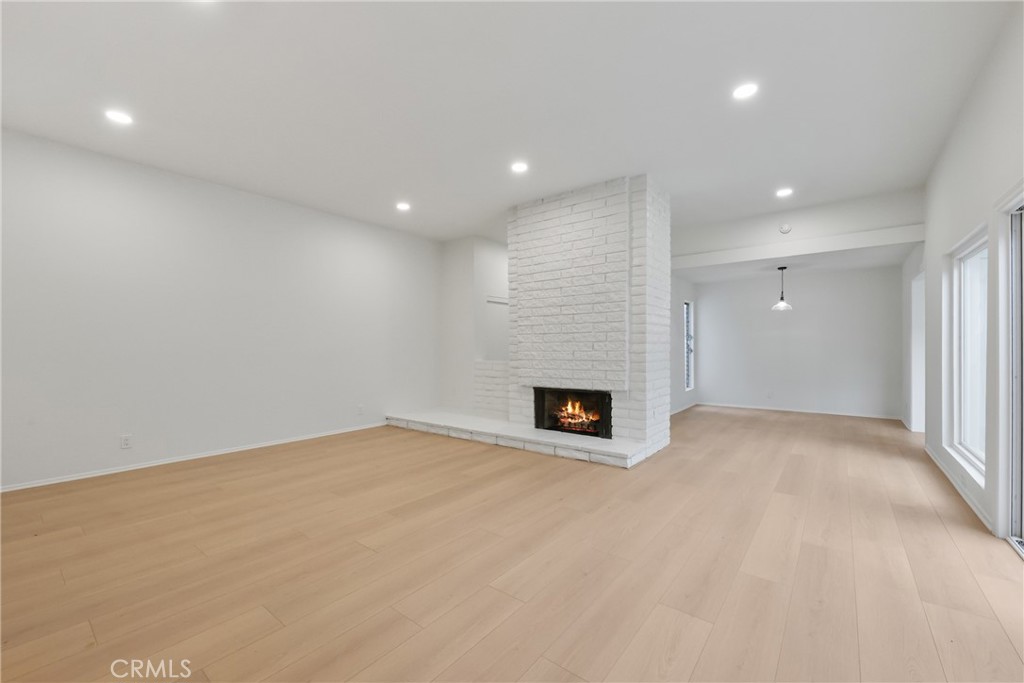 71 Seton Road Irvine, CA 92612 - Photo 1 of 22 a view of an empty room with a fireplace