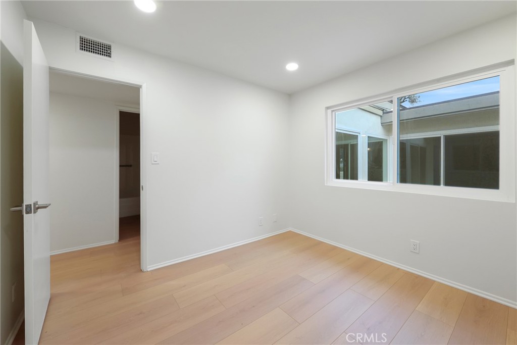 71 Seton Road Irvine, CA 92612 - Photo 12 of 22 a view of an empty room with a window