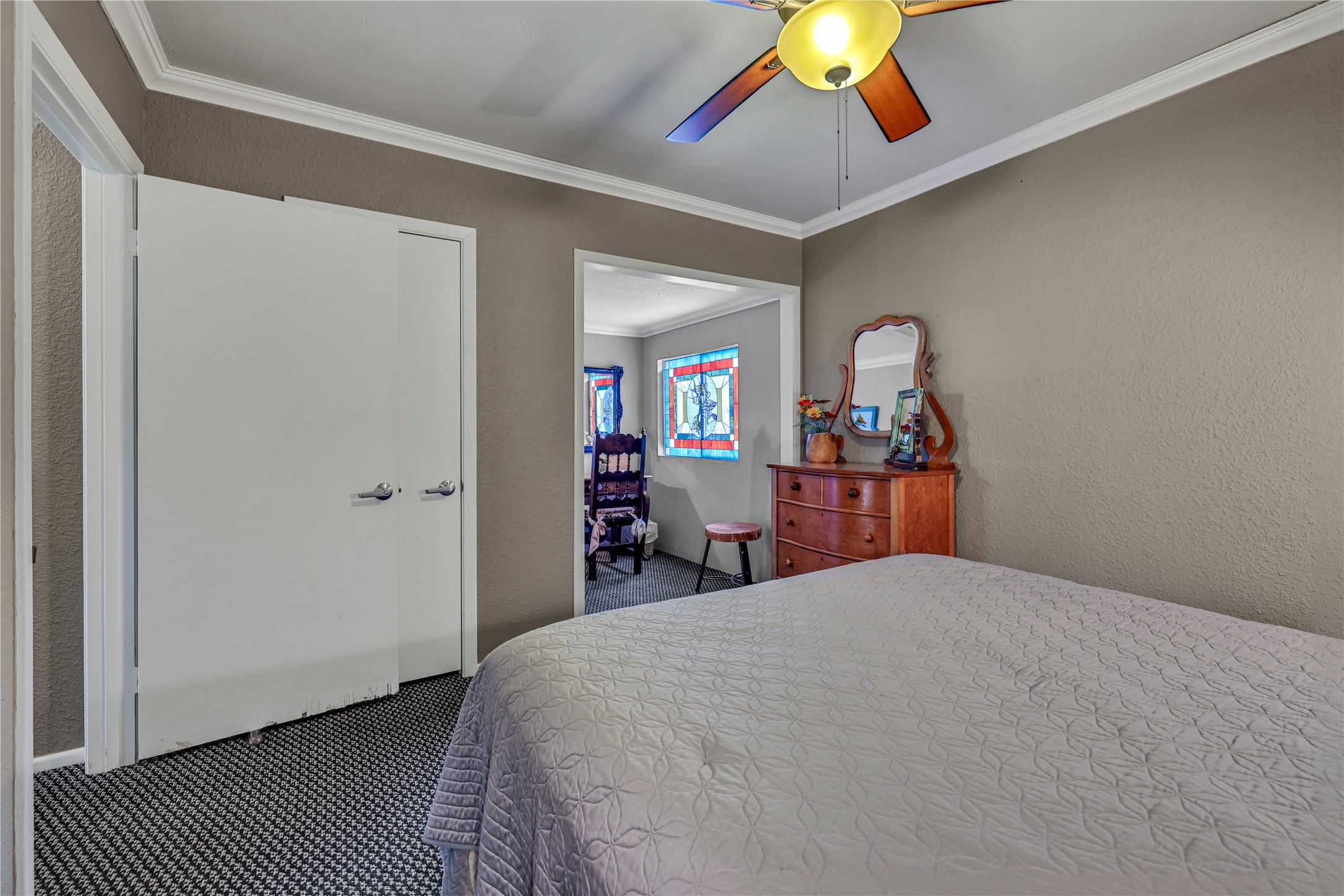 146 Villa Way Coldspring, TX 77331 - Photo 16 of 37 Bedroom 1 - this bedroom has an additional space utilized as a study nook