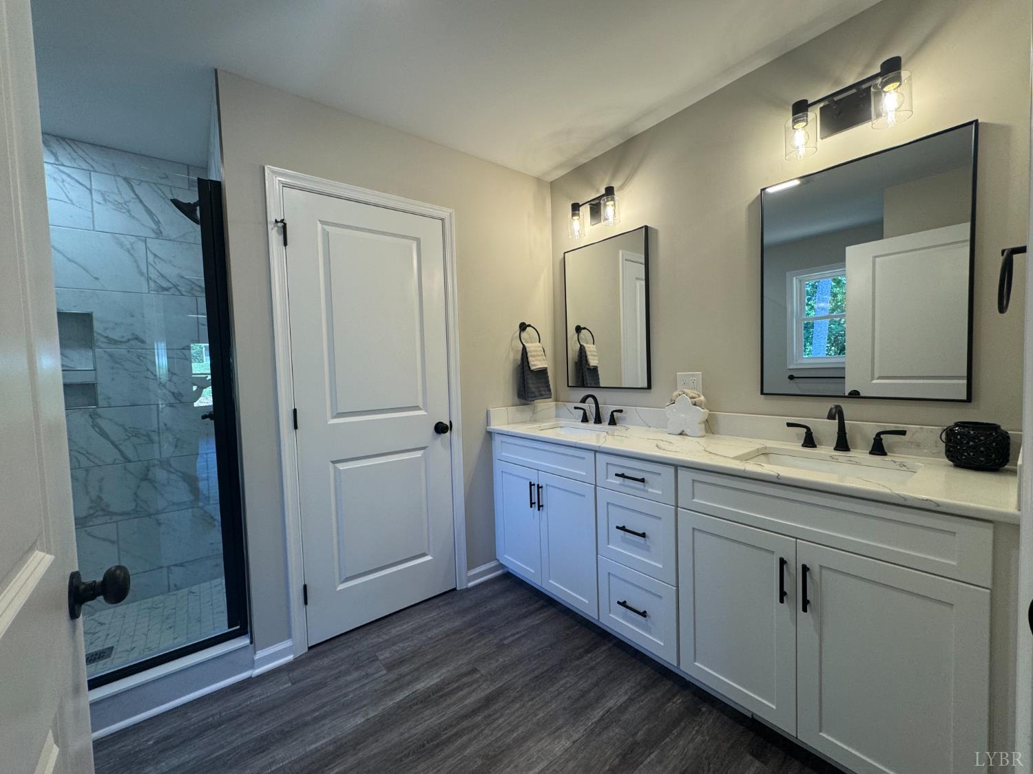 2350 Spg Grv Road Spout Spring, VA 24593 - Photo 11 of 24 a spacious bathroom with double sink and a mirror