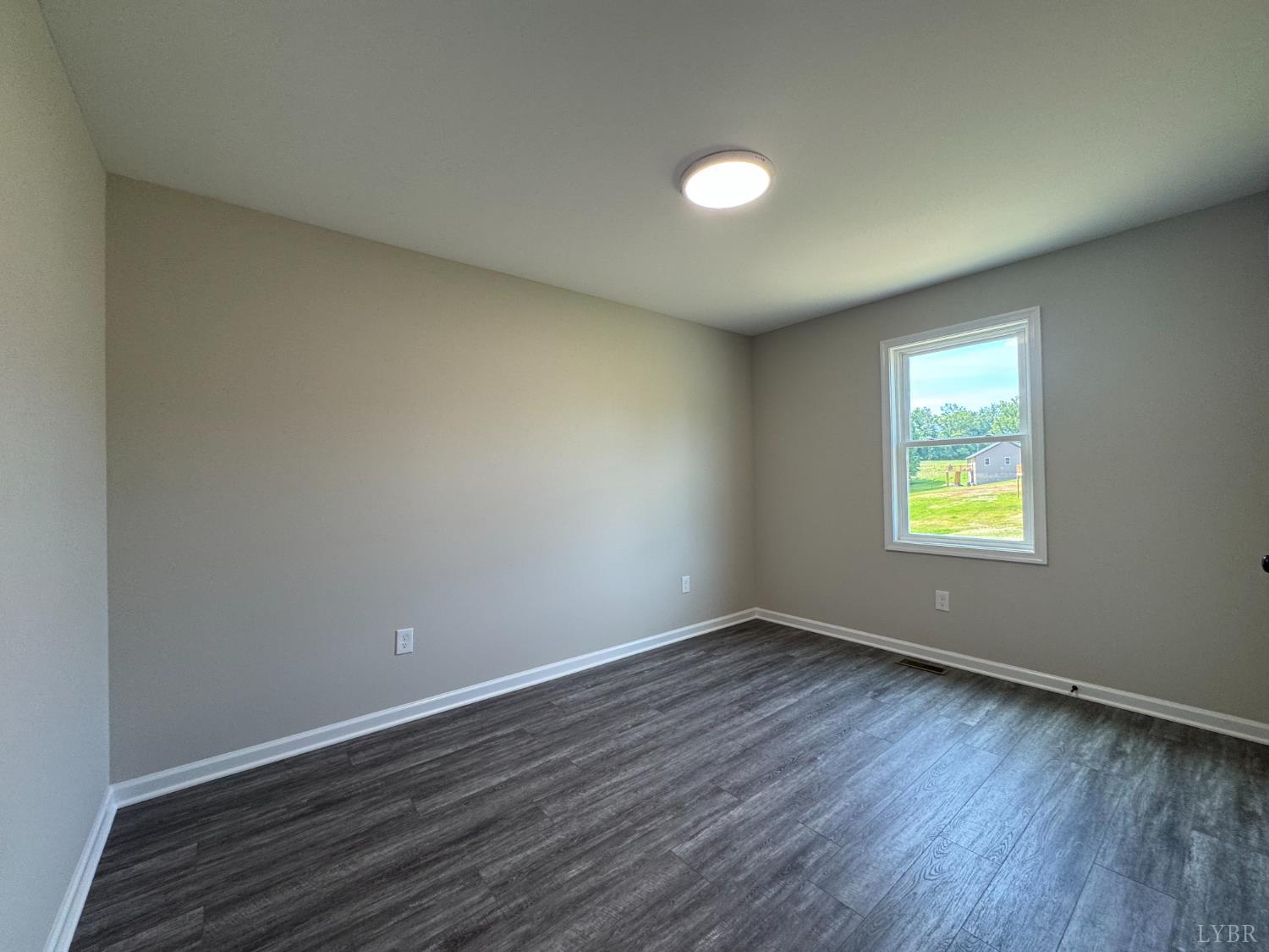 2350 Spg Grv Road Spout Spring, VA 24593 - Photo 18 of 24 a view of an empty room and window