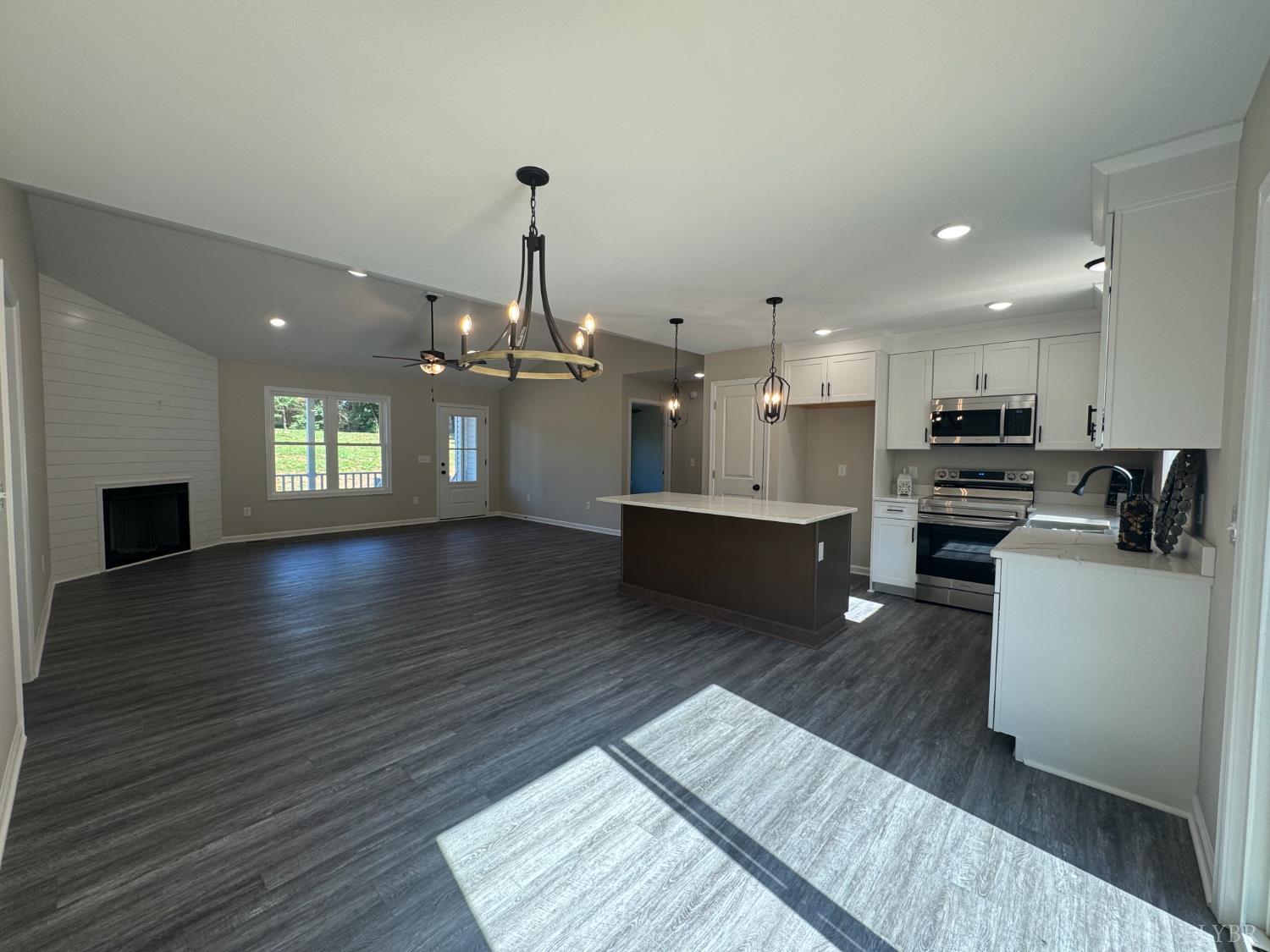 2350 Spg Grv Road Spout Spring, VA 24593 - Photo 7 of 24 a view of kitchen with sink and wooden floor