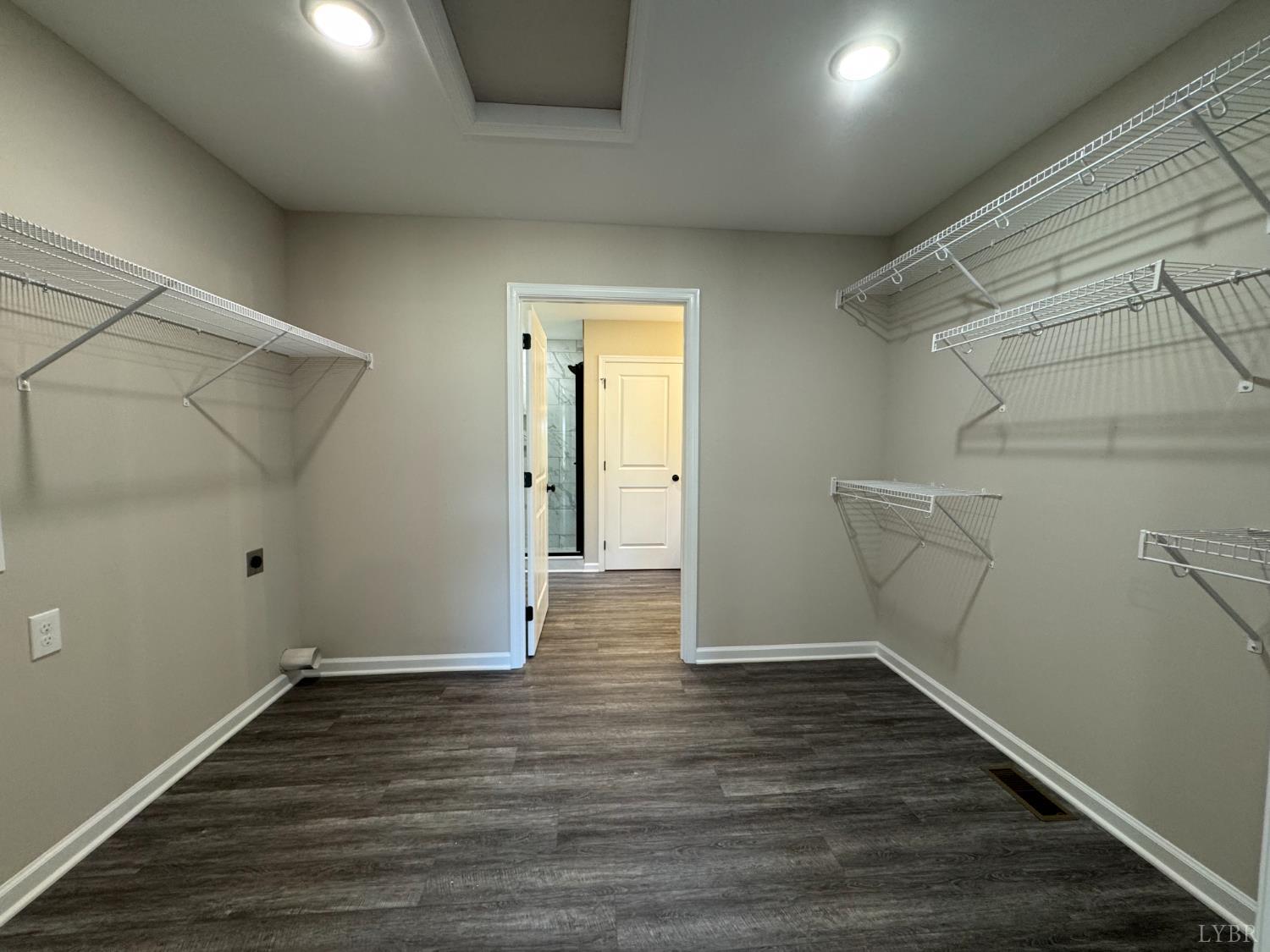2350 Spg Grv Road Spout Spring, VA 24593 - Photo 10 of 24 a view of an empty room with wooden floor and closet