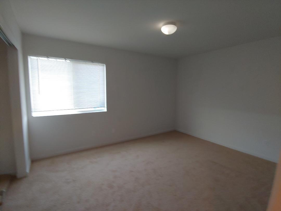 1190 Hazelnut Lane Madera, CA 93637 - Photo 16 of 18 an empty room with a window