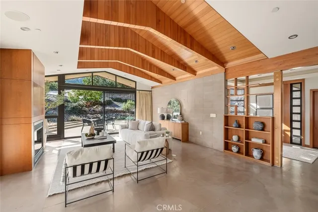 a view of a chairs and table in the patio