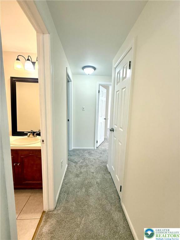 1045 Barnside Road Allentown, PA 18103 - Photo 19 of 29 a view of a bathroom from a hallway