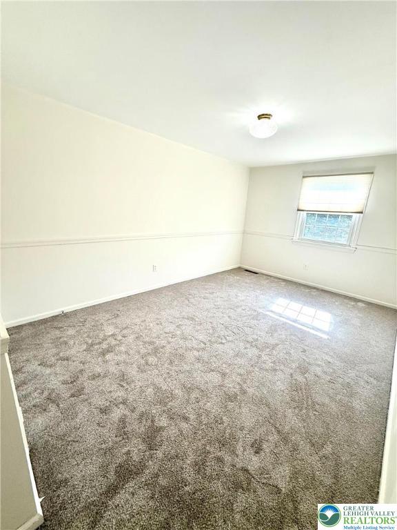 1045 Barnside Road Allentown, PA 18103 - Photo 26 of 29 an empty room with a projector