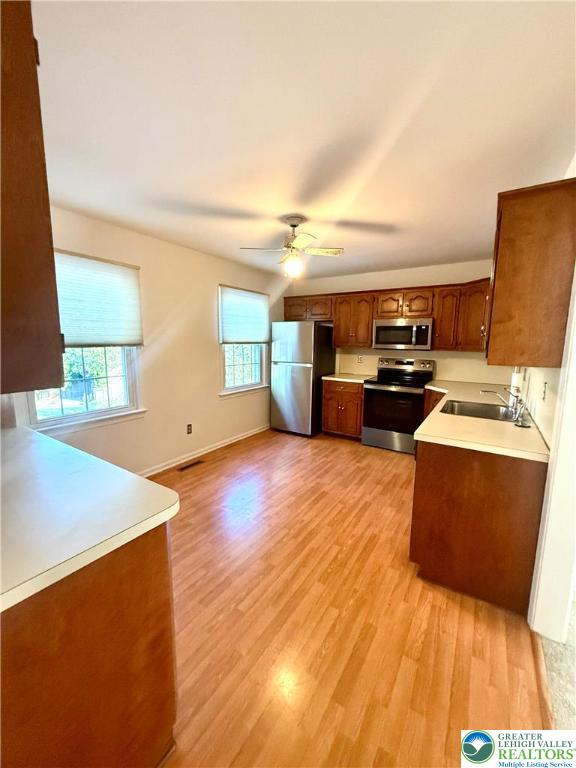 1045 Barnside Road Allentown, PA 18103 - Photo 28 of 29 a living room with furniture and a flat screen tv
