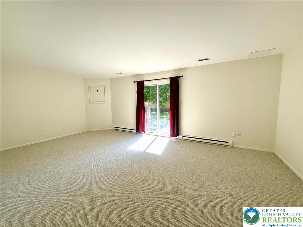 1045 Barnside Road Allentown, PA 18103 - Photo 6 of 29 an empty room with a empty space and windows