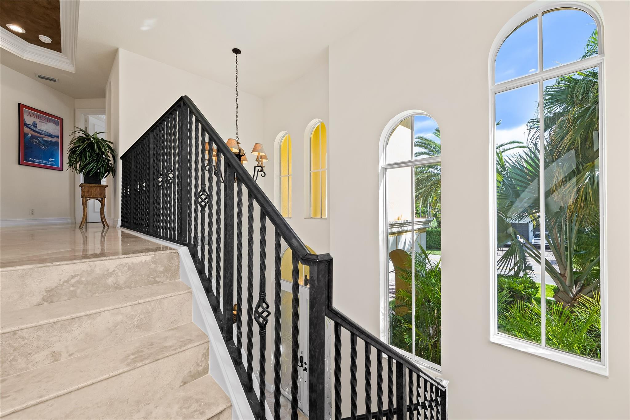 2637 Northeast 28th Court Lighthouse Point, FL 33064 - Photo 14 of 50 a view of staircase with railing and plants