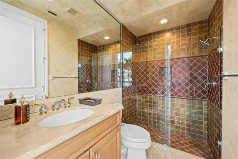 a utility room with sink dryer and washer