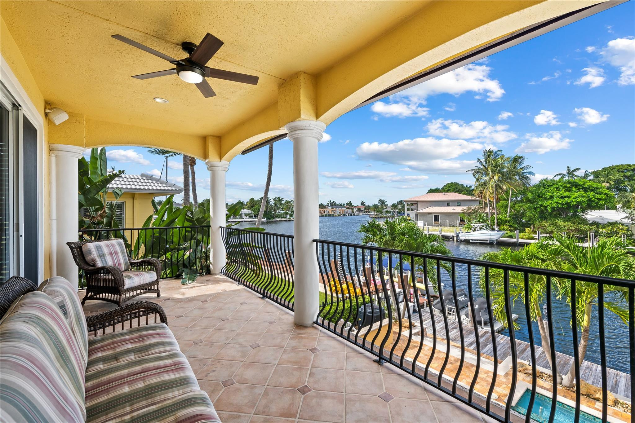 2637 Northeast 28th Court Lighthouse Point, FL 33064 - Photo 5 of 50 a view of a patio with a table and chairs
