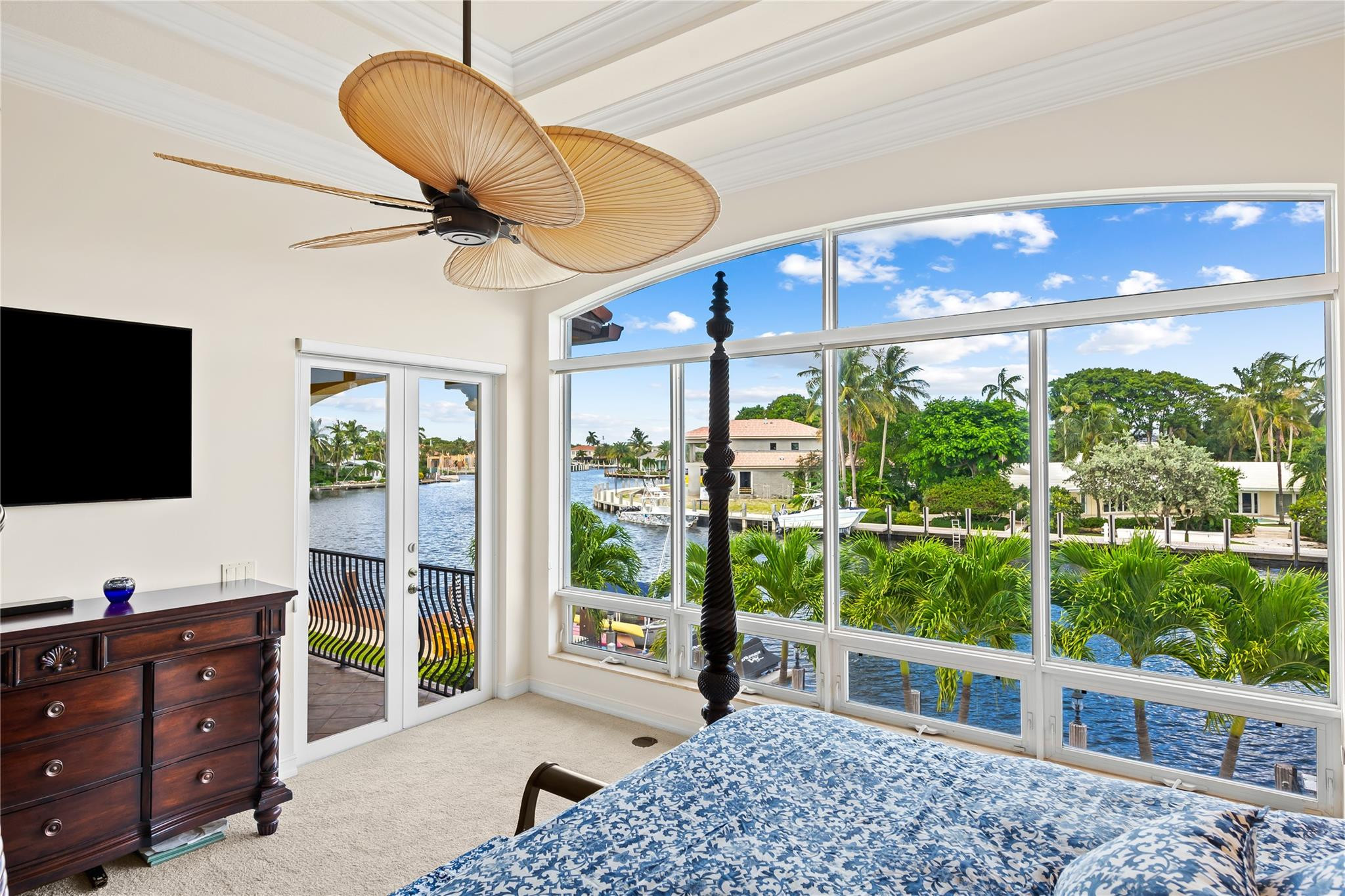 2637 Northeast 28th Court Lighthouse Point, FL 33064 - Photo 6 of 50 a bedroom with furniture and a large window