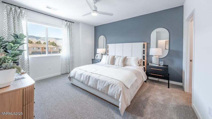 1031 Middle Gate Road Carson City, NV 89701 - Photo 18 of 29 a bedroom with a bed and a window
