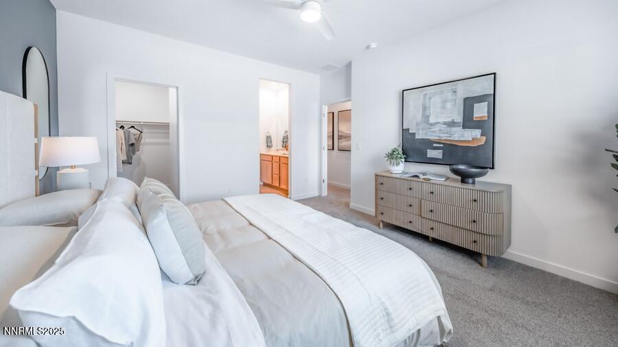 1031 Middle Gate Road Carson City, NV 89701 - Photo 20 of 29 a bedroom with a bed and a couch