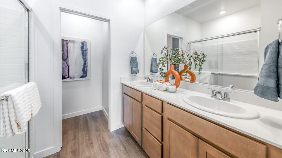 1031 Middle Gate Road Carson City, NV 89701 - Photo 21 of 29 a bathroom with a sink and a mirror
