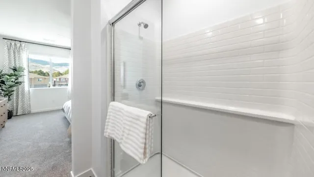 a bathroom with a shower and a tub