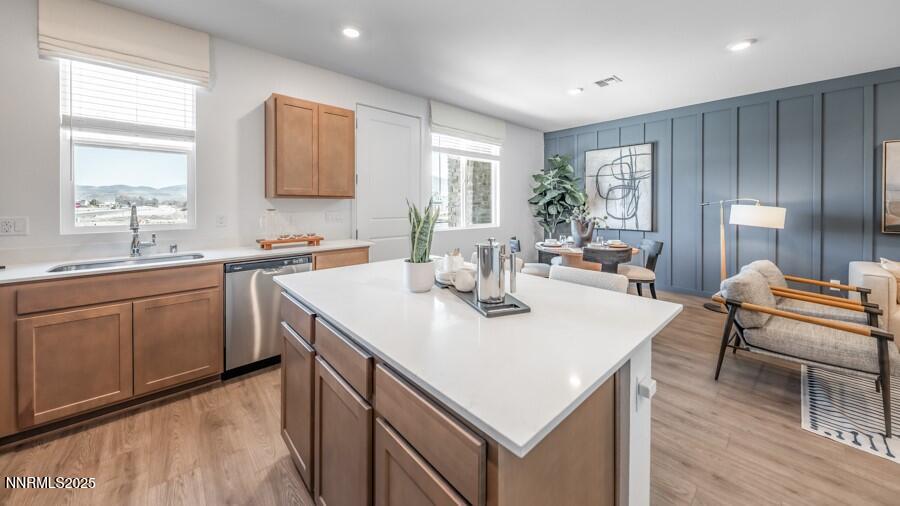 1031 Middle Gate Road Carson City, NV 89701 - Photo 7 of 29 a kitchen with a sink stove and cabinets