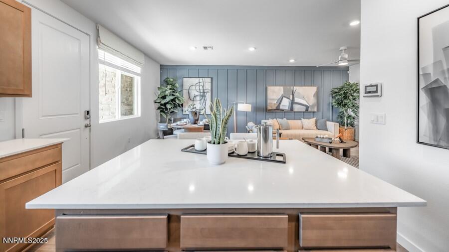 1031 Middle Gate Road Carson City, NV 89701 - Photo 8 of 29 a large white kitchen with a large window