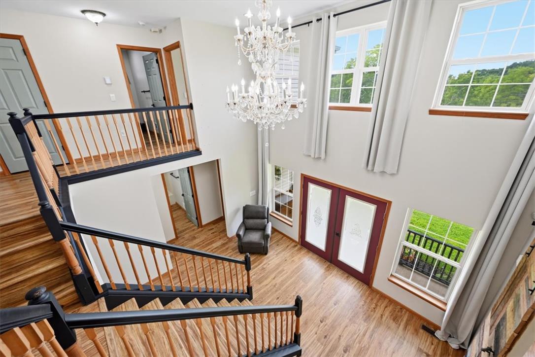 387 Blue Ridge Road Saylorsburg, PA 18353 - Photo 41 of 90 Grand two-story foyer welcomes with a sweeping staircase and abundant natural light.