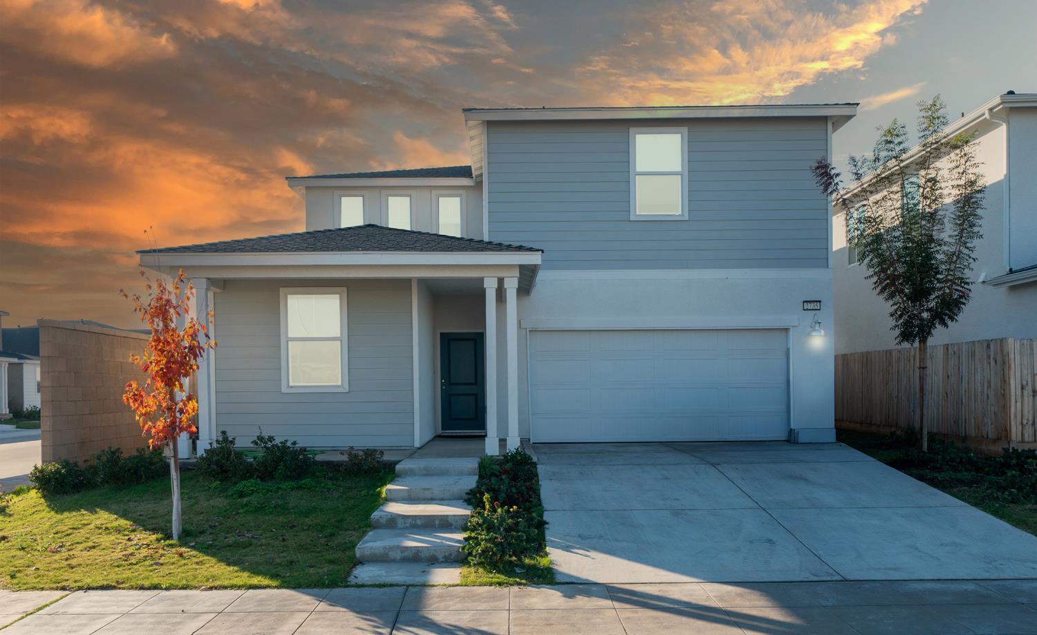a front view of house with yard