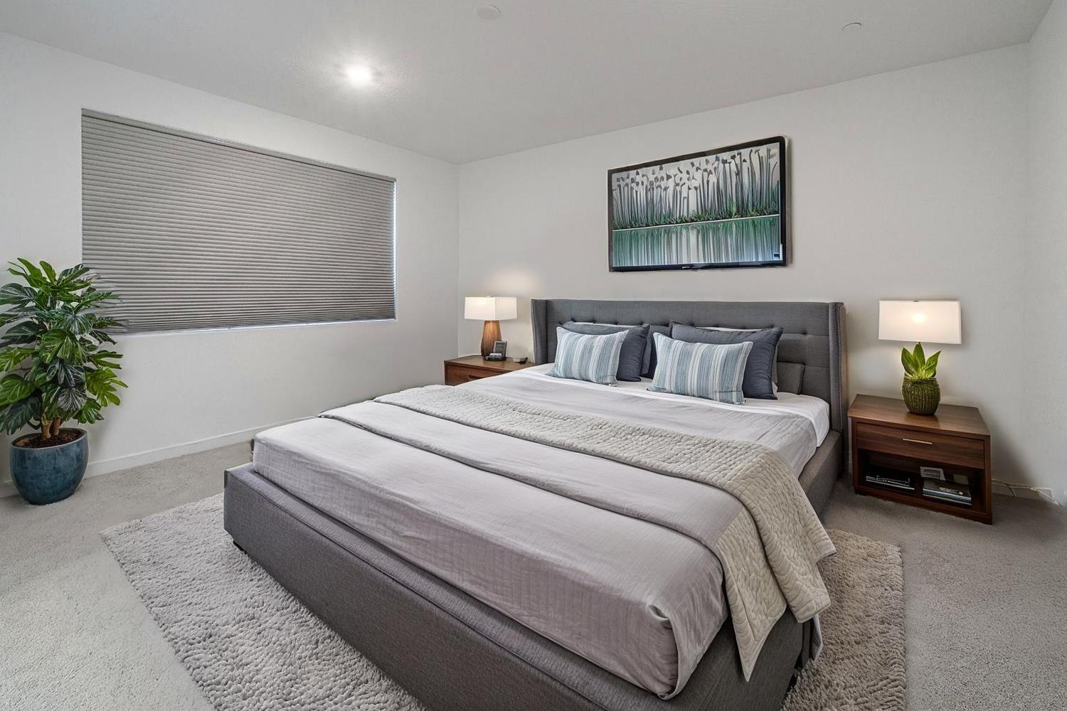 2735 North Redda Road Fresno, CA 93737 - Photo 14 of 20 a bedroom with bed and window