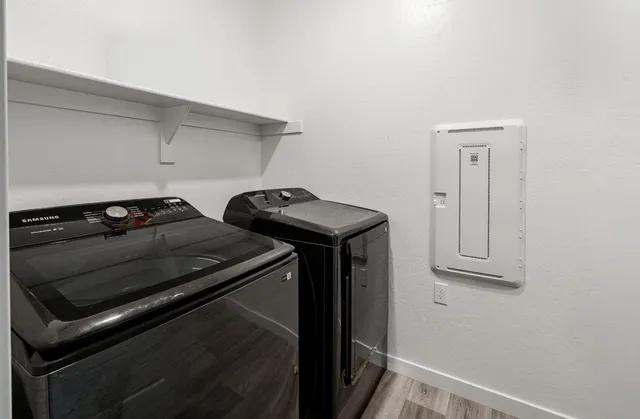 a kitchen with a stove and a microwave