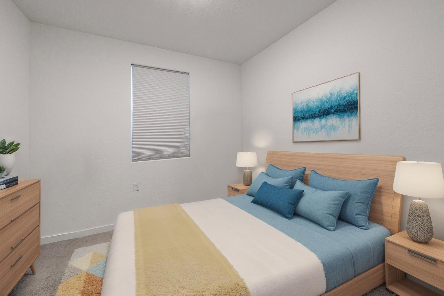 2735 North Redda Road Fresno, CA 93737 - Photo 8 of 20 a bedroom with a bed and a lamp on the dresser