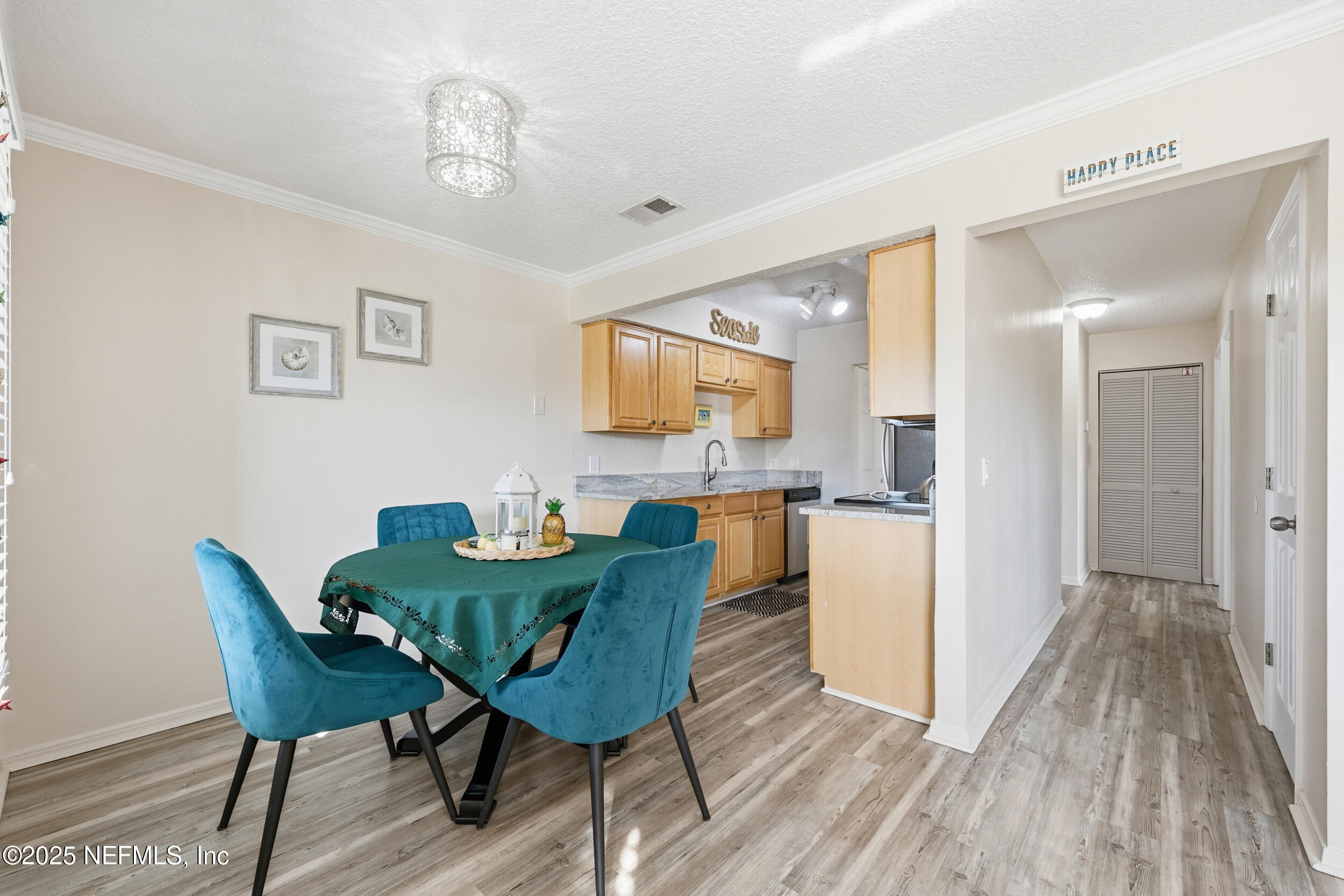 47 Clipper Court St. Augustine, FL 32080 - Photo 12 of 50 a view of a dining room with furniture and wooden floor