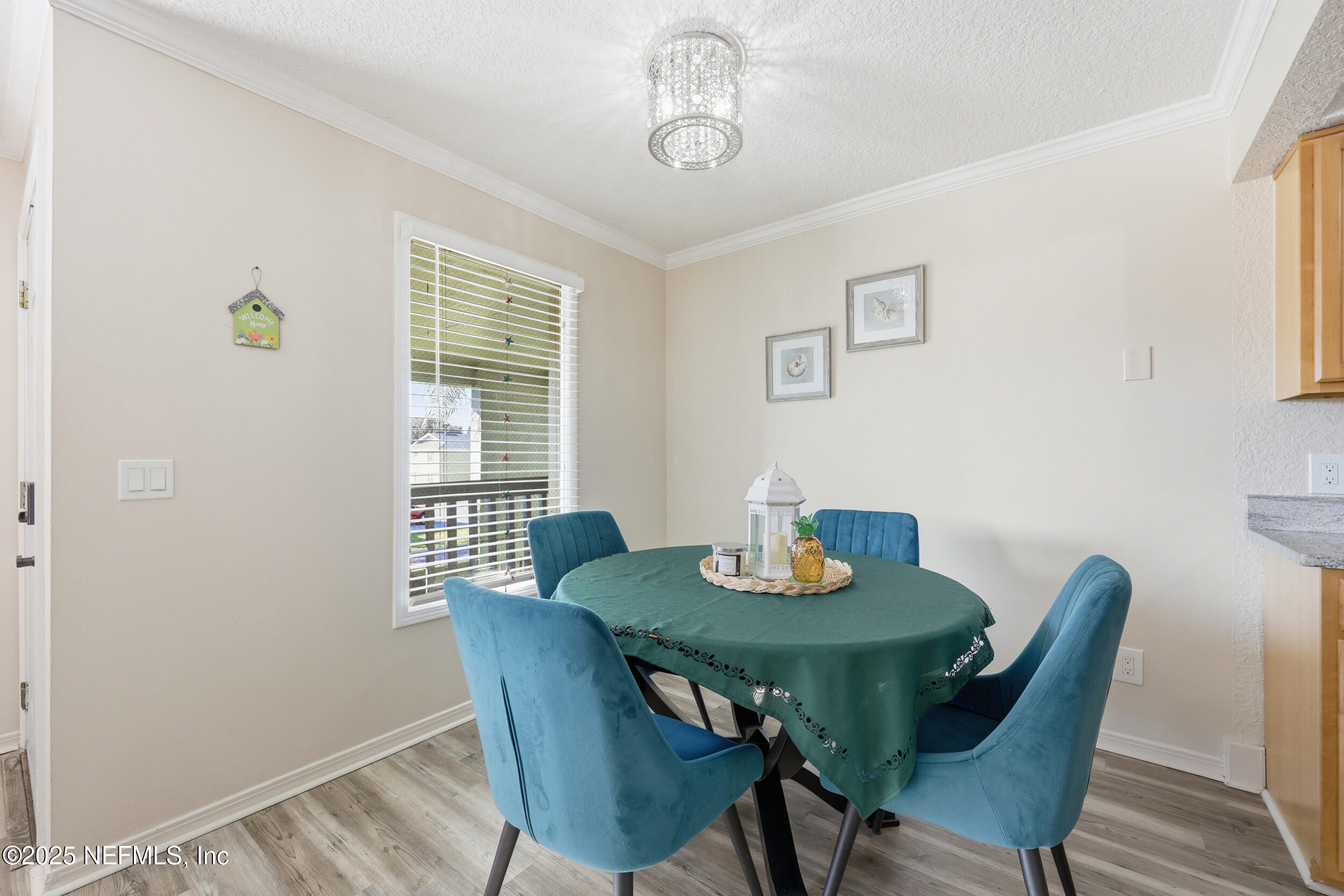 47 Clipper Court St. Augustine, FL 32080 - Photo 13 of 50 a view of a dining room with furniture window and wooden floor